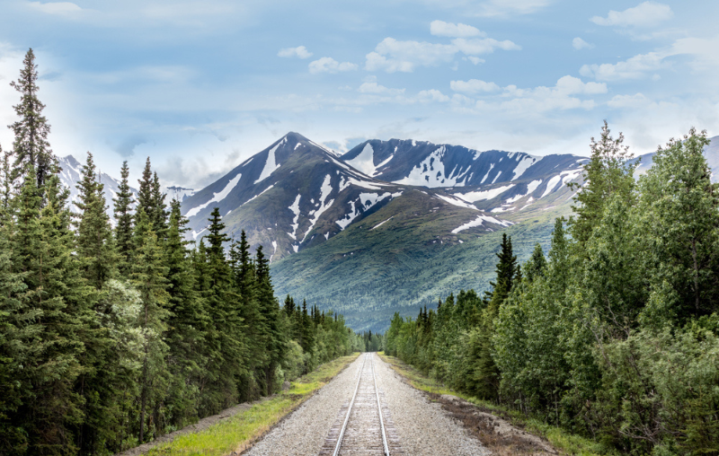 Mountain range and railroad track in Denali National Park Alaska