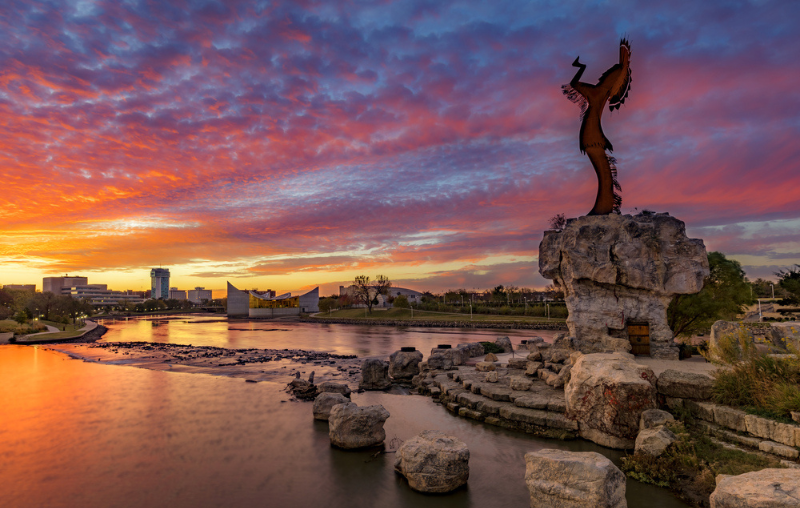 Keeper of the Plains and City Skyline at Sunrise