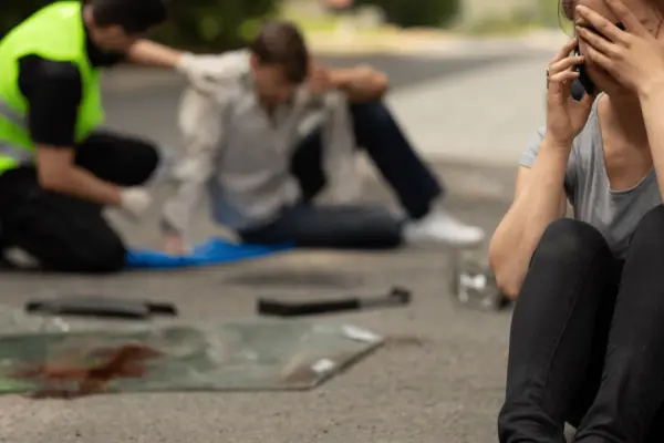 A car accident victim calls a lawyer about the settlement timeline.