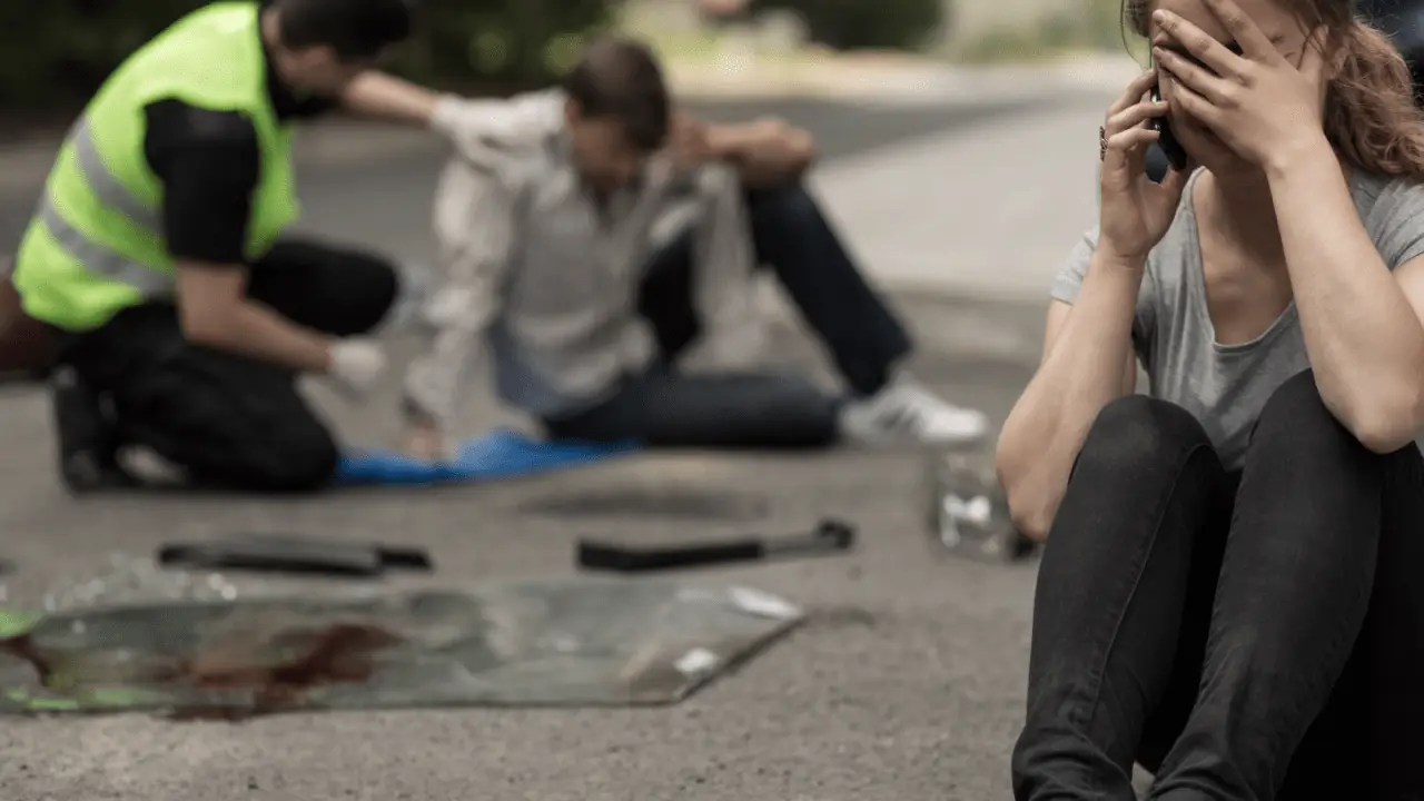 Car accident victim consulting with a personal injury attorney about the possibility of going to court.
