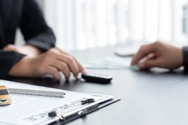 Ohio car accident victim meeting with a lawyer to discuss no-fault crash compensation options