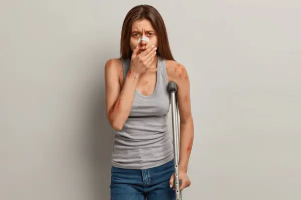 An injured and emotional client who is in pain and suffering.