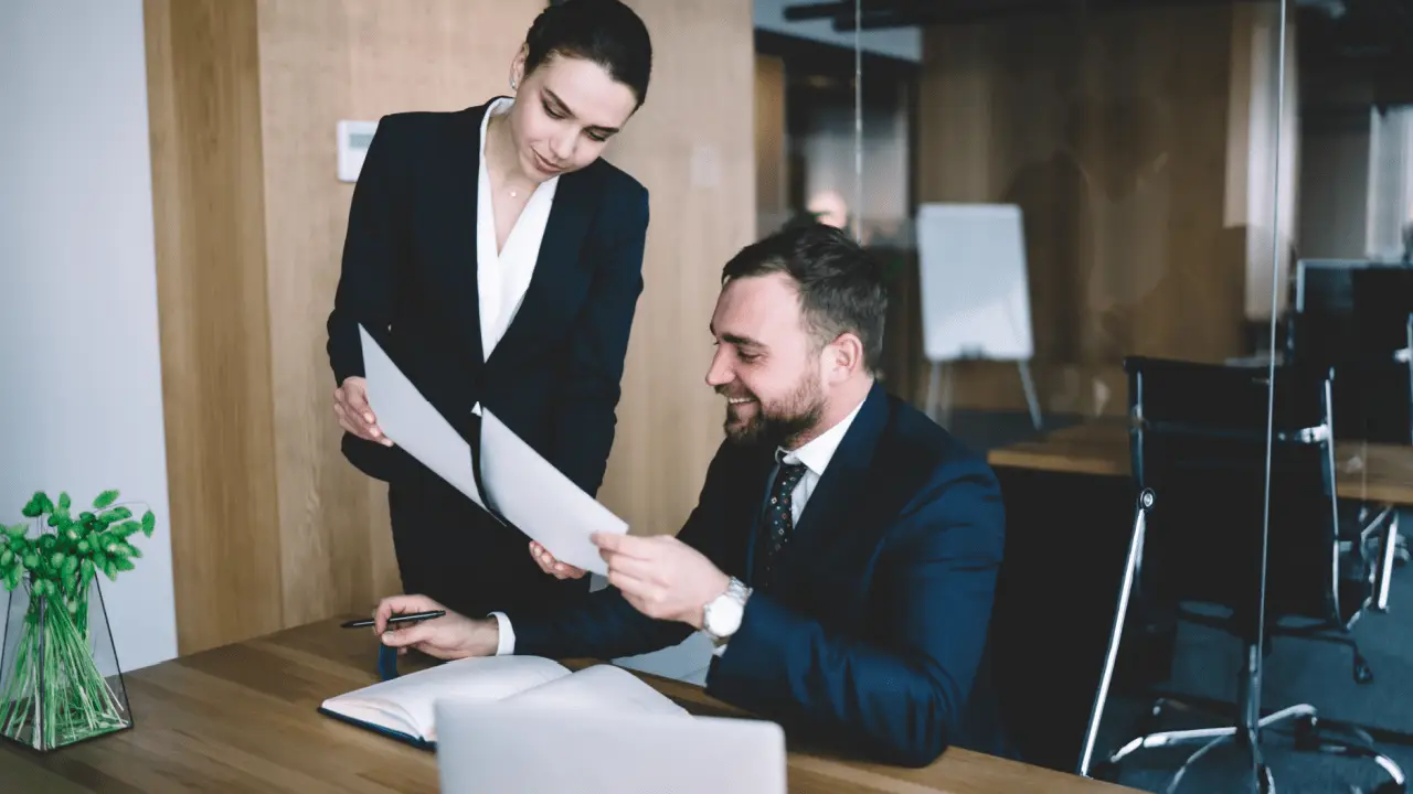 Legal professionals reviewing documents what is the letter from a lawyer after a car accident correspondence office meeting