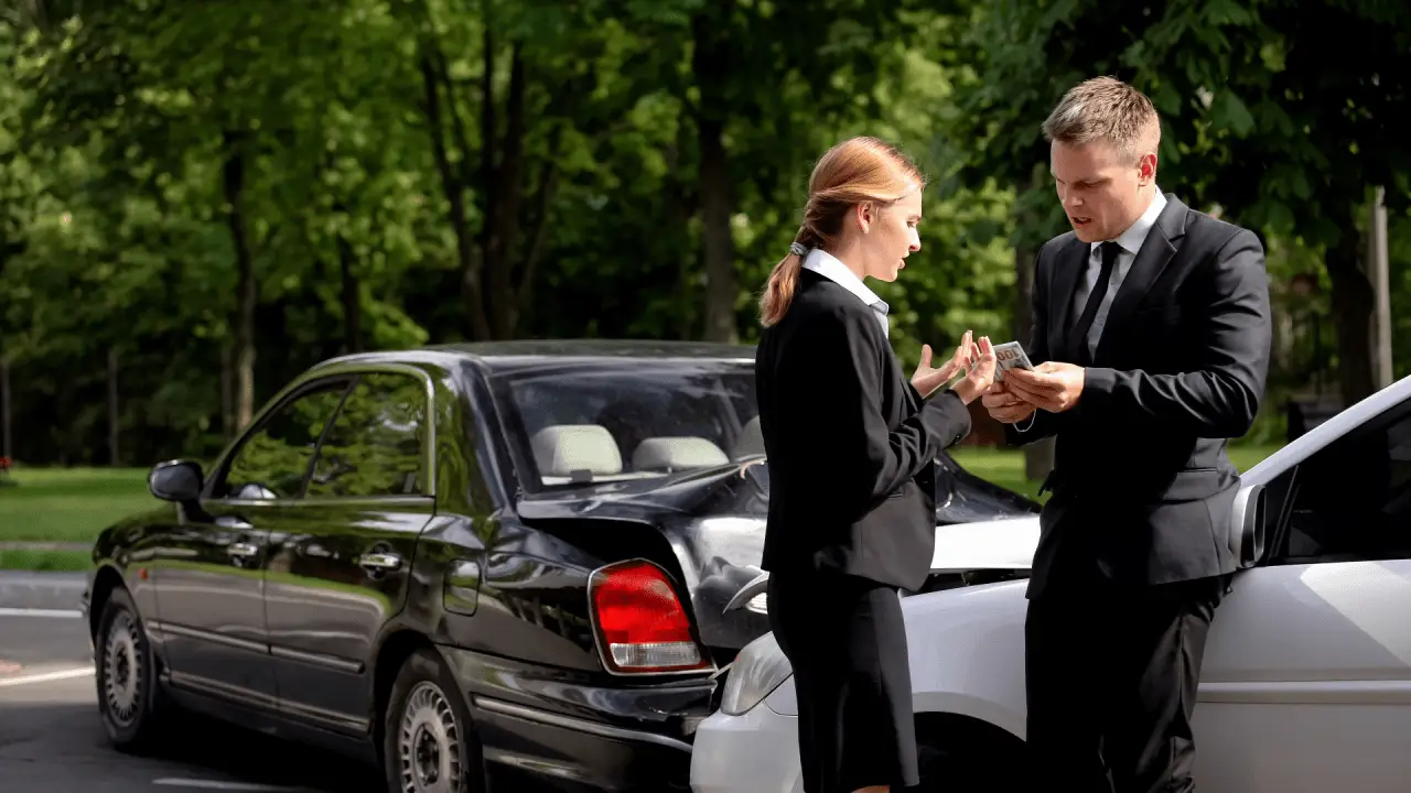 Insurance adjuster explaining how do you negotiate a higher settlement in a car accident to accident victim