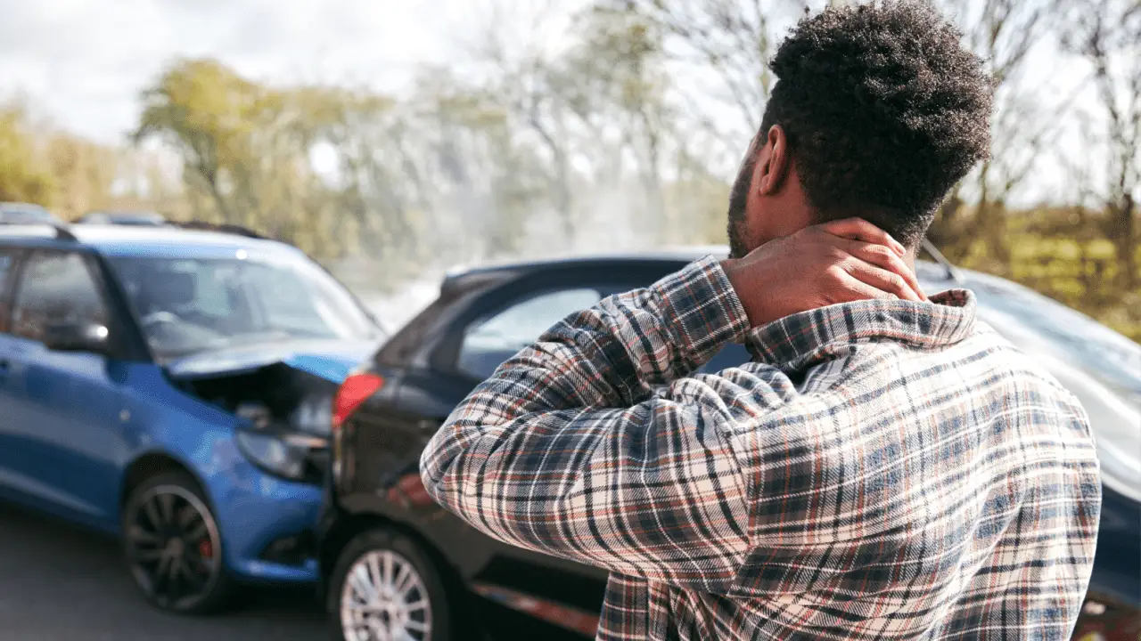 Man with neck pain after car accident wondering how long does a car accident settlement take