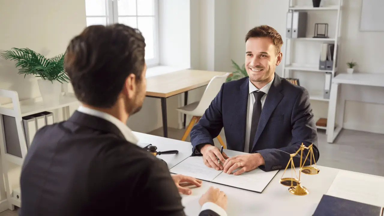 Client consultation meeting showing how to choose the best personal injury lawyer for your case