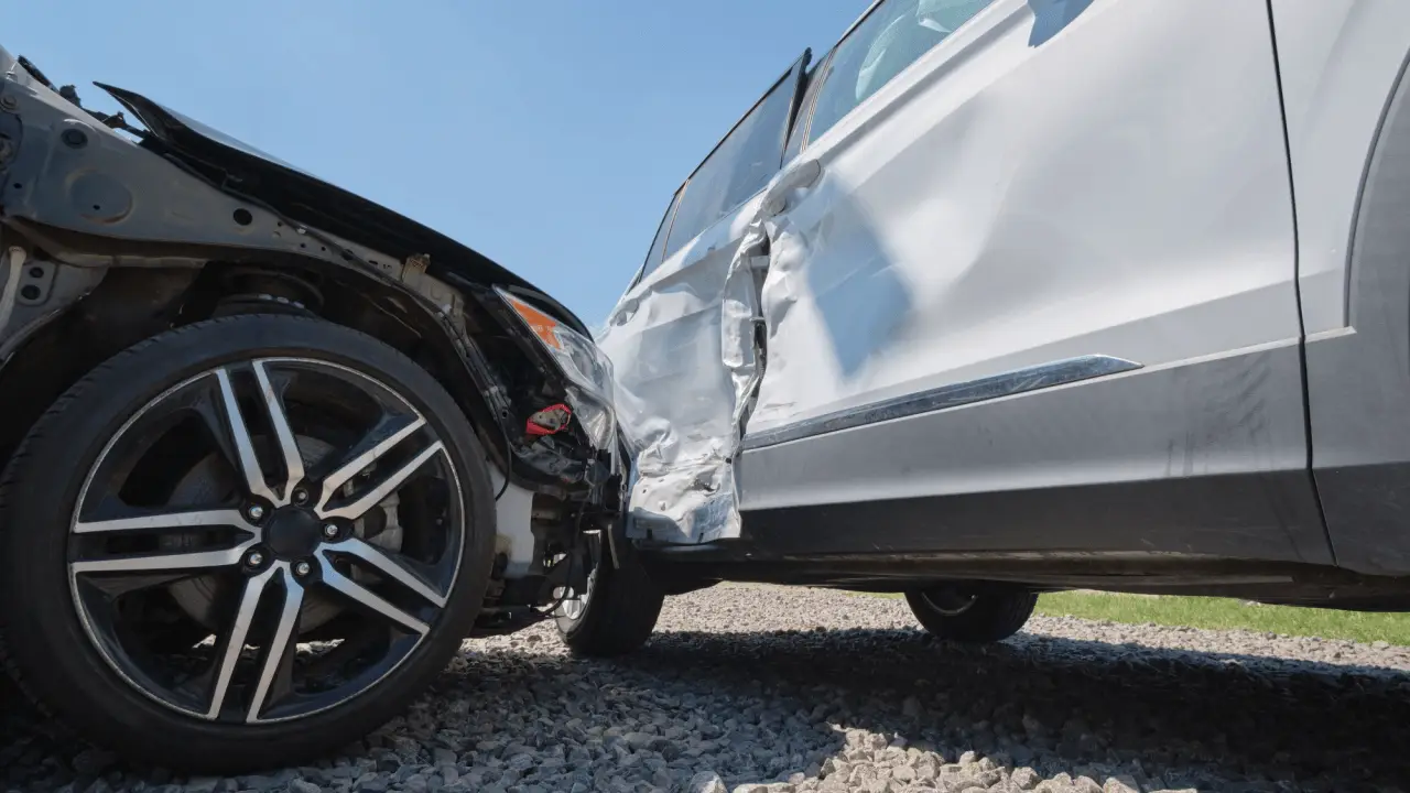 Car accident damage showing how to settle an injury claim without a lawyer documentation needs