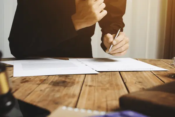 Personal injury lawyer reviewing case documents to determine do personal injury lawyers take cases they cant win