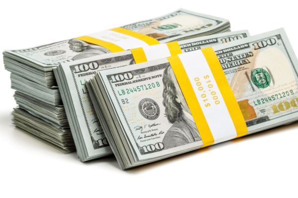 Stacks of hundred dollar bills representing how much money should I ask for in a settlement