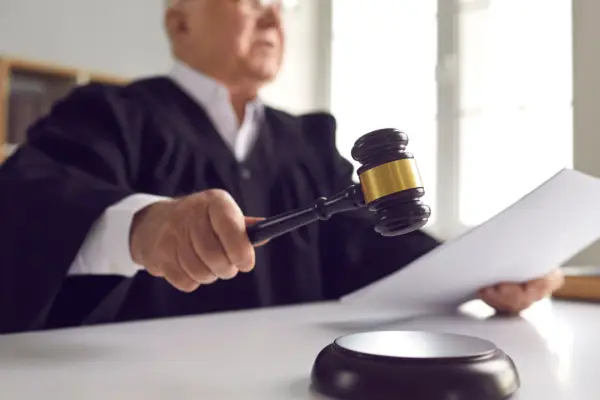Judge with gavel deciding what are the chances of winning a car accident lawsuit