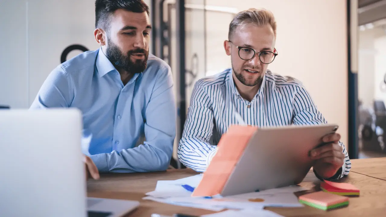 Bicycle accident lawyers reviewing case documents and legal information with client during consultation