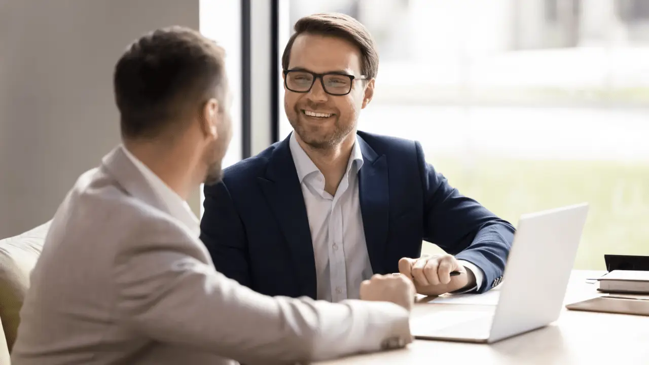 Professional lawyer with client during bicycle accident legal process consultation in office