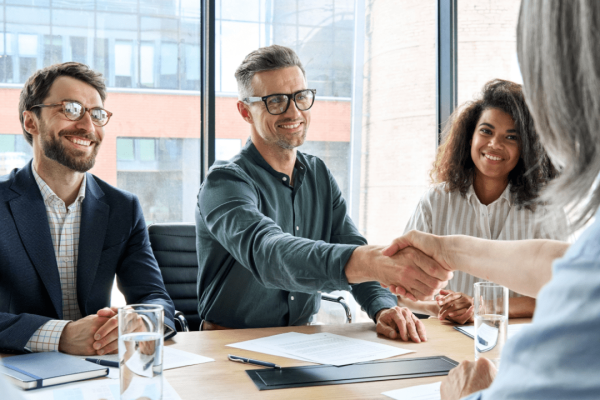 Injury lawyers meeting with client to discuss whether case will go to court during free consultation