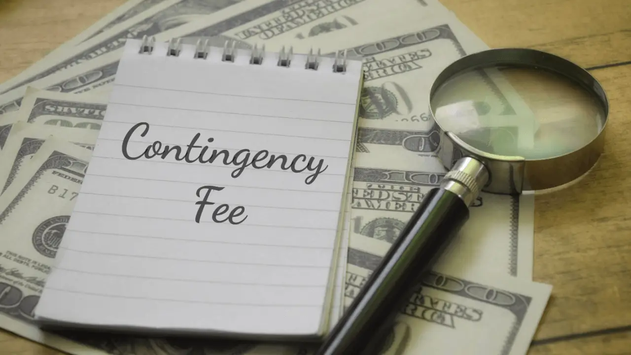 Notepad displaying contingency fee text with cash and magnifying glass explaining how do contingency fees work in personal injury cases