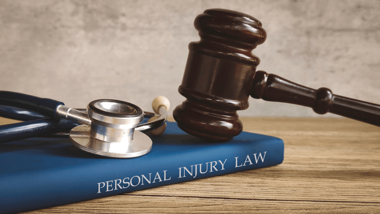 Judge's gavel and medical stethoscope on personal injury law book representing what are the chances of winning a personal injury lawsuit