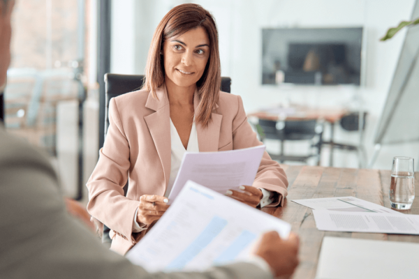 Personal injury lawyer discussing average lawyer fees and case costs with client during consultation