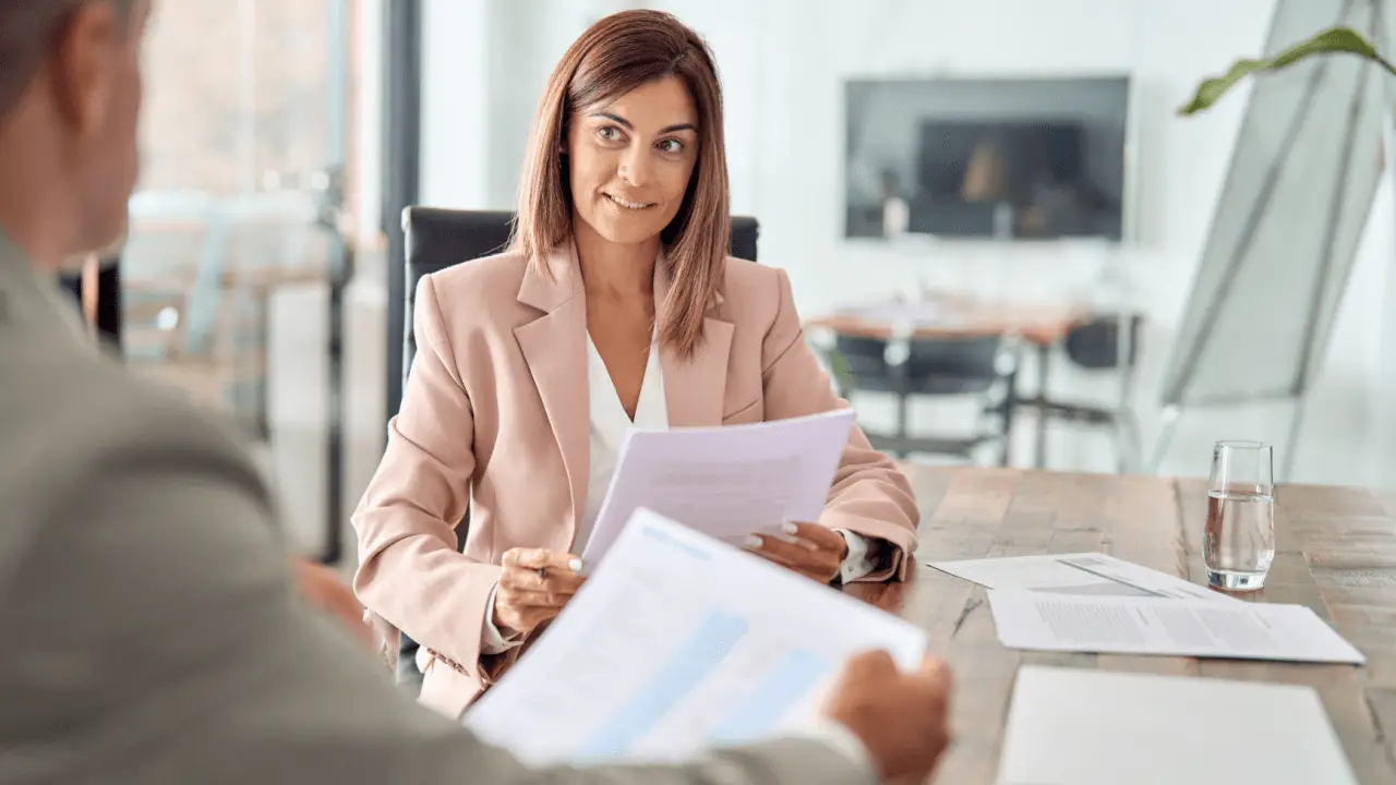 Personal injury lawyer discussing average lawyer fees and case costs with client during consultation