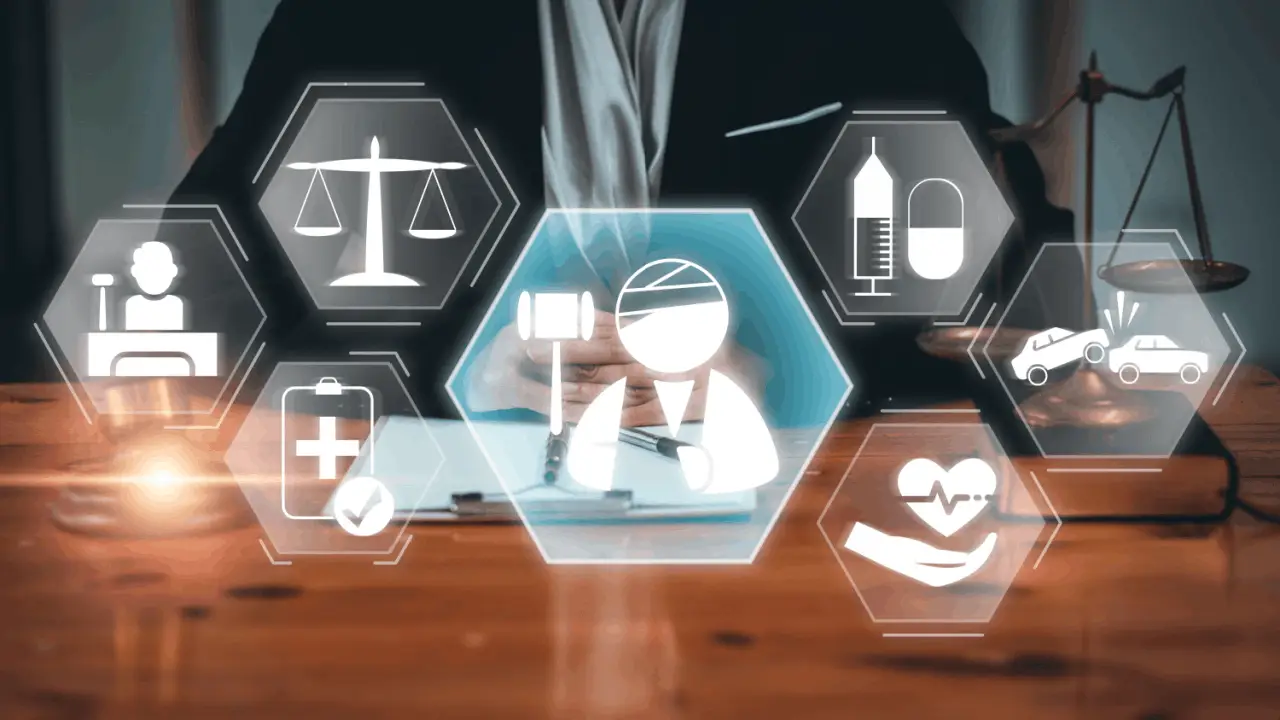 Legal professional reviewing documents with digital icons representing what is the hardest injury to prove in personal injury cases