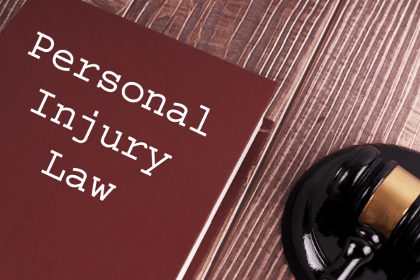 Personal injury law book with judge's gavel representing what should I expect from my personal injury lawyer and legal expertise