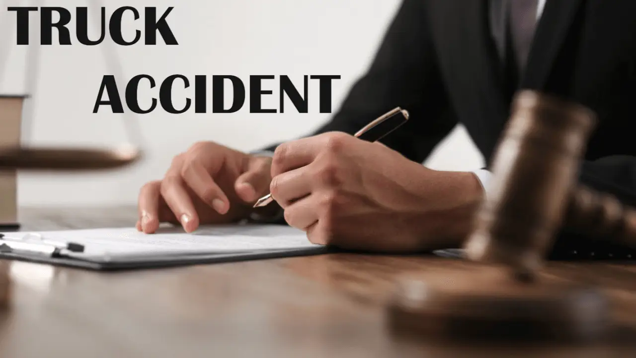 Lawyer reviewing truck accident case documents with client to determine legal representation needs