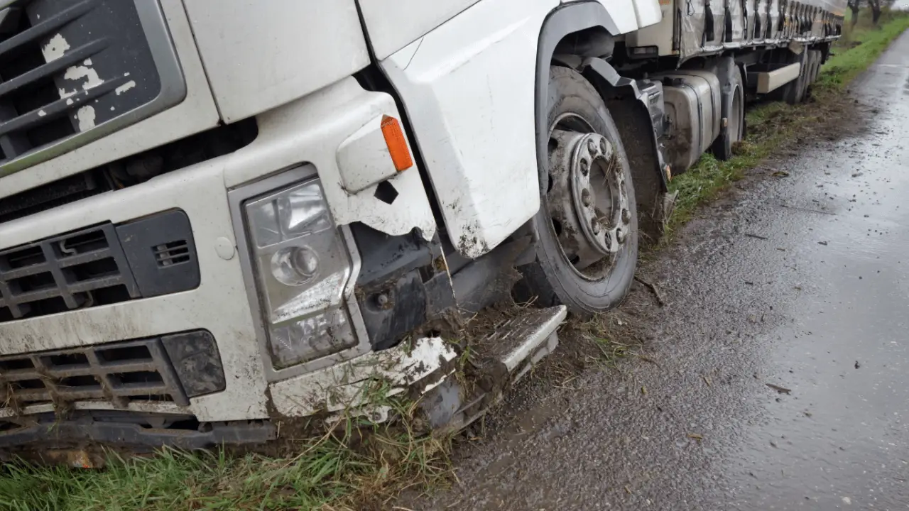 Damaged commercial truck after accident showing settlement timeline importance