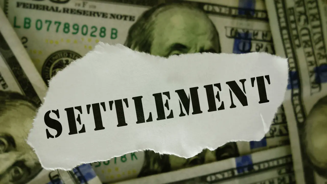 Truck accident settlement timeline concept showing settlement document on cash compensation